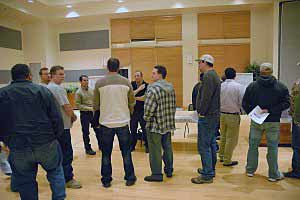 Talking with the public at the Price open house Price Open House