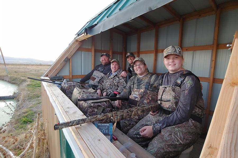 Hunters sitting in a duck blind