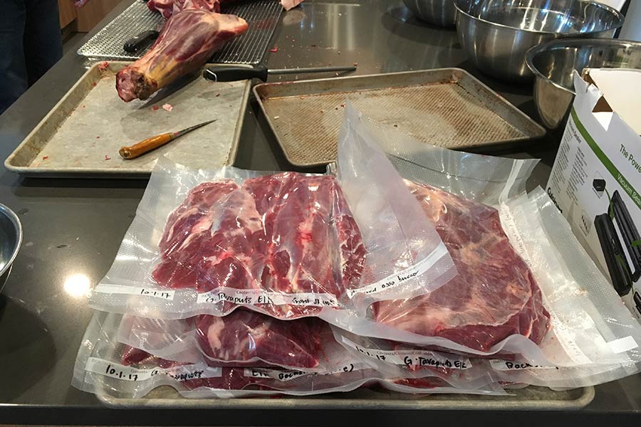 Butchered elk meat that in sealed plastic packages