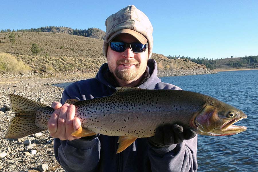 Man holding cutthroat trout at Panguitch Lake