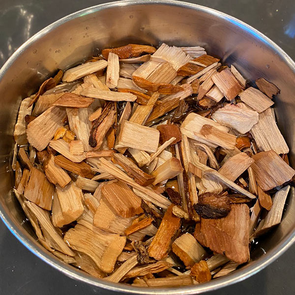 A bin full of wood chips soaked in water