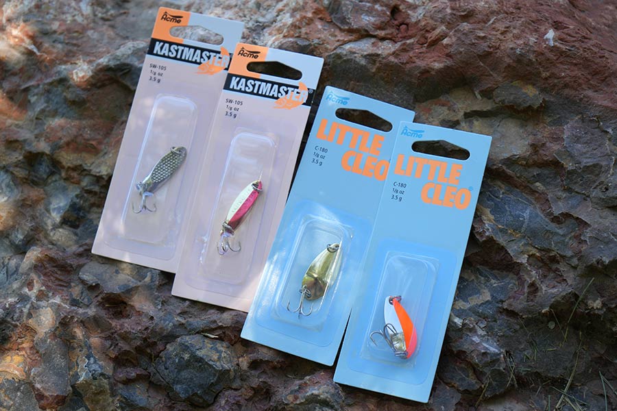 Packaged fishing spoons, including Acme Kastmaster and Little Cleo brand spoons