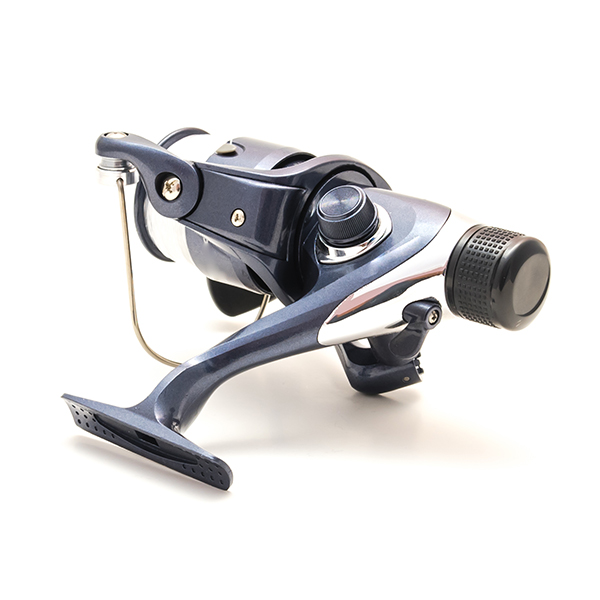 Spinning fishing reel, showing case and exposed reel