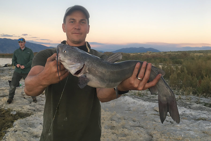 Michael Packer holding a caught catfish
