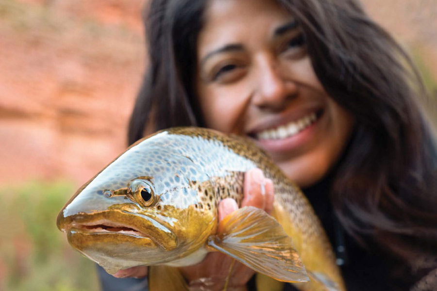 Female angler holding a fish