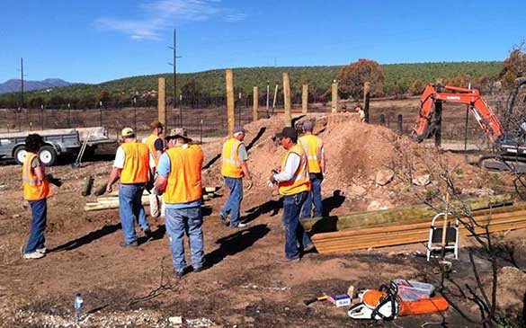 Large group of dedicated hunters participating in a service project