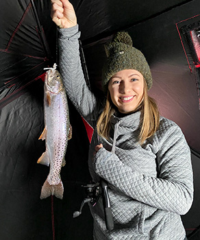Female angler holding a caught Bear Lake cutthroat trout