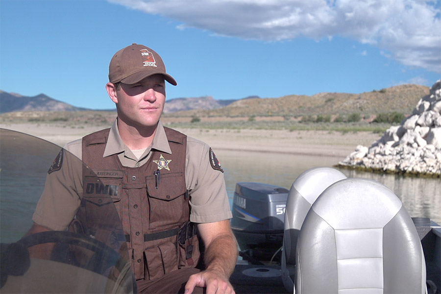 DWR conservation officer in a patrol boat