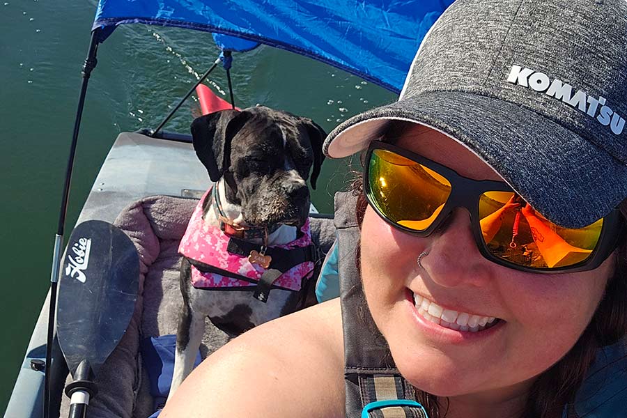 Erin Mathis and her dog in a kayak