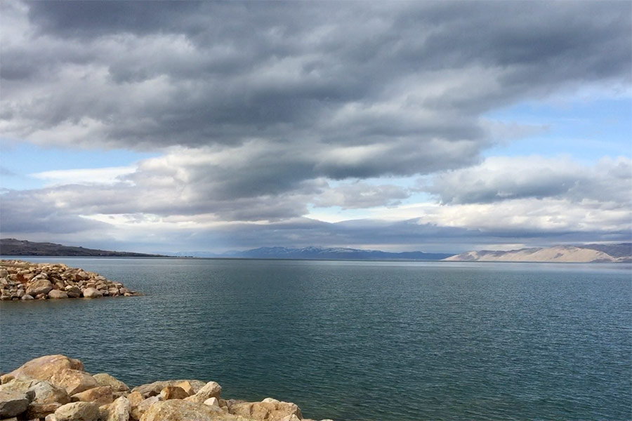 View of Bear Lake from the rocky shore, on a cold, cloudy day