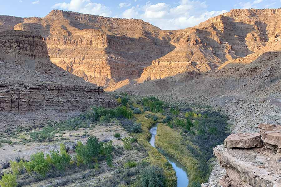 The Price River in a canyon at sunset