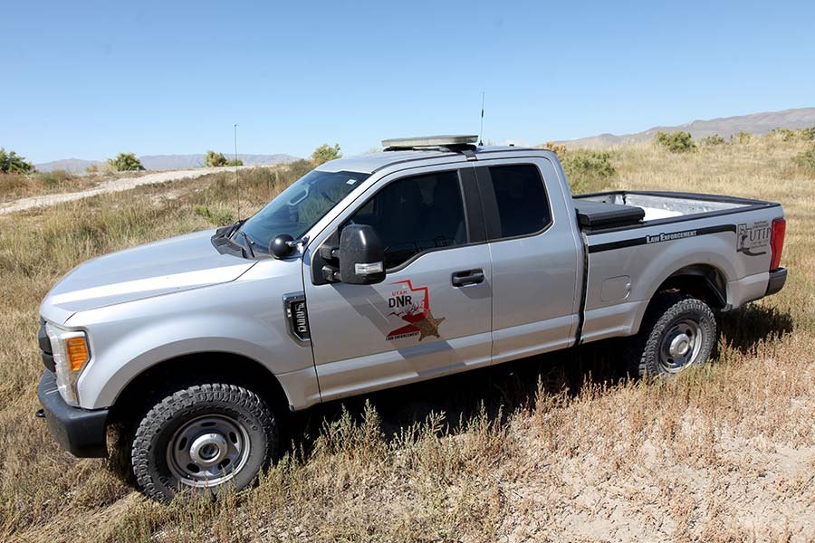 DWR Law Enforcement truck, parked on a hill